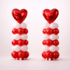 Pair of Valentine’s Day balloon towers with red heart-shaped foil balloons, alternating red and white latex balloon columns, and compact balloon bases on a neutral background.