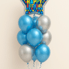 Balloon bouquet featuring a star-shaped foil balloon with a colorful “Happy Birthday” design, complemented by metallic blue and silver latex balloons, tied with matching ribbons.