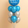Balloon bouquet with a large blue foil “Happy Birthday” balloon, surrounded by metallic blue and silver latex balloons, and a blue-and-silver mini balloon base.