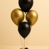 Elegant black and gold balloon arrangement with a matching balloon base.