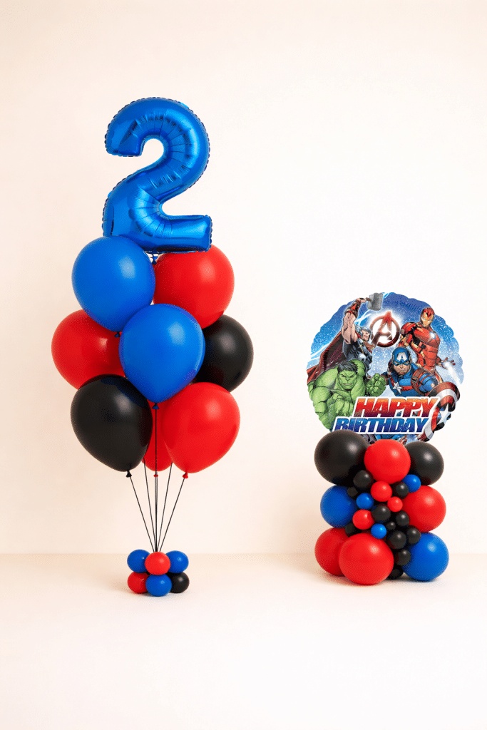 Superhero birthday balloon set with blue number balloon bouquet and matching red blue and black character balloon tower