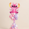 Balloon arrangement with Angel foil balloon on a pink, lilac, and white twisted balloon column and base.