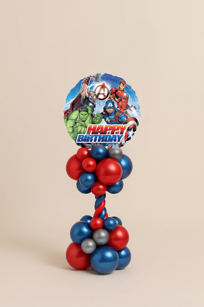 Balloon tower with superhero Happy Birthday foil balloon on a red, blue, and silver twisted balloon column and base.