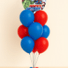 Balloon bouquet with superhero Happy Birthday foil balloon and red and blue latex balloons on a mini balloon base.