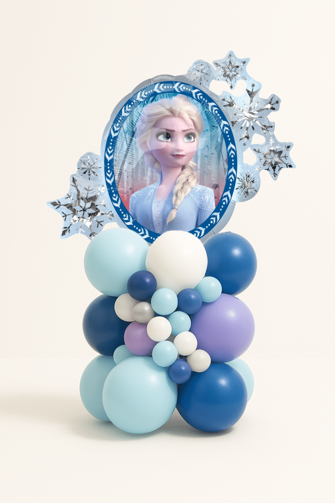 Frozen-themed balloon tower with Elsa snowflake foil balloon, icy blue, lilac, navy, silver, and white latex balloons in a clustered base.
