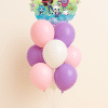 Gabby’s Dollhouse balloon bouquet with rainbow music foil balloon and pastel pink, purple, and white latex balloons with balloon base.