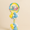Gabby’s Dollhouse balloon tower with PAW-tastic foil balloon featuring Gabby Cats characters, decorated with a spiral yellow, blue, and white balloon base.