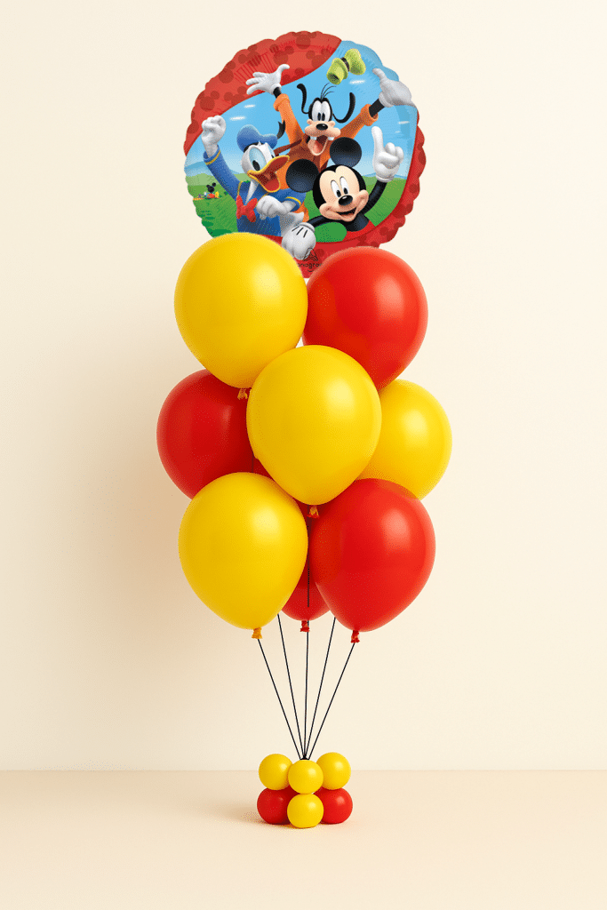 Mickey Mouse and friends birthday balloon bouquet with red and yellow latex balloons and character foil balloon on neutral background