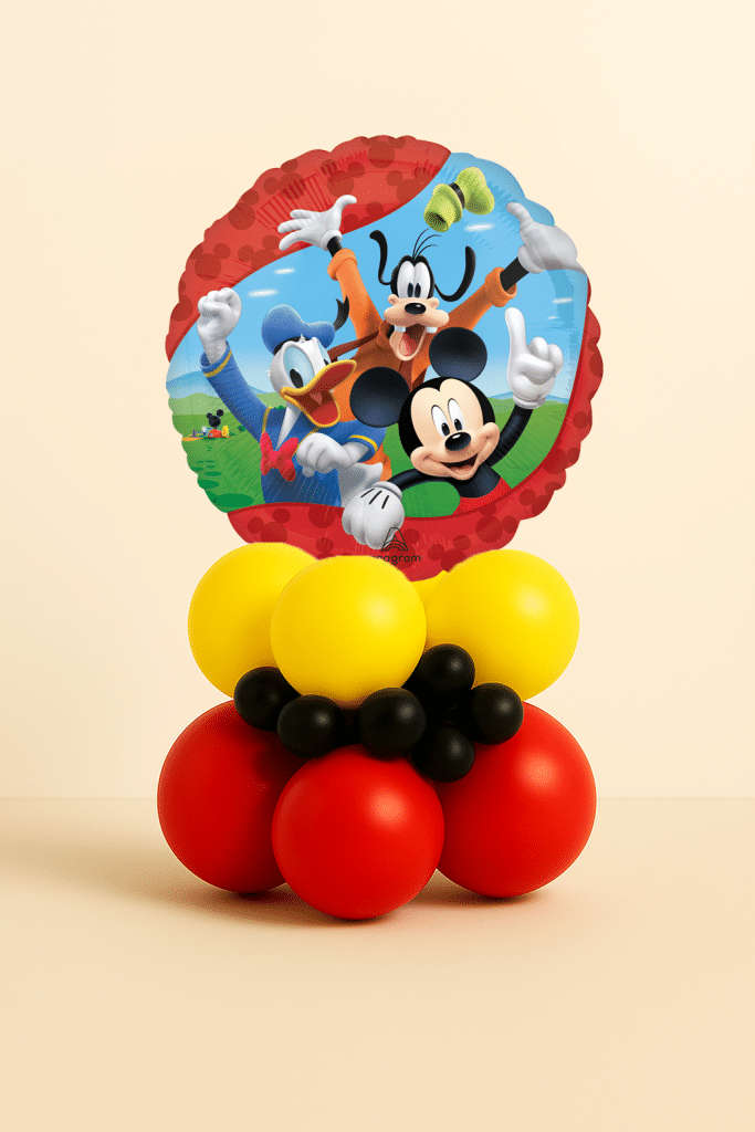 Mickey Mouse Donald Duck and Goofy foil balloon table centerpiece with red, yellow and black latex balloon base on neutral background