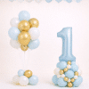 Light blue number one balloon tower with matching blue white and gold bouquet and loose blue and white ceiling balloons