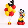 Mickey Mouse birthday balloon set with black number balloon bouquet and standing Mickey character balloon base in red yellow and black colours