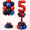 Red blue and black birthday balloon set with custom number column and matching latex balloon bouquet on floor-standing bases