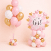 Pink white and gold baby shower balloon bouquet with matching It’s a Girl foil balloon column and heart accents floor standing celebration set