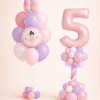 Pastel pink and lilac ballerina birthday balloon bouquet with ballet shoes topper and matching number balloon column floor standing decoration