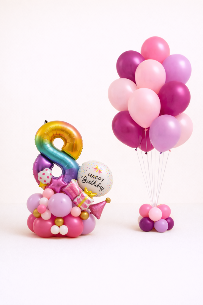 Rainbow number birthday balloon arrangement with happy birthday bubble balloon and matching pink and purple helium balloon bouquet