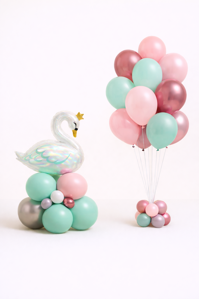 Elegant swan birthday balloon arrangement with mint blush and rose gold latex balloons and matching helium balloon bouquet
