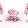Mermaid themed birthday balloon arrangement with pastel number balloon, rose gold and silver centrepiece and two matching helium balloon bouquets