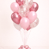 Rose gold and blush pink balloon bouquet with chrome metallic and clear confetti balloons on a matching small balloon base