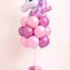 Unicorn head foil balloon bouquet with blush pink and chrome magenta latex balloons on a matching small balloon base