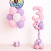 Gabby’s Dollhouse birthday balloon duo with pastel number column and character foil bouquet in pink lavender and white colours on matching small balloon bases