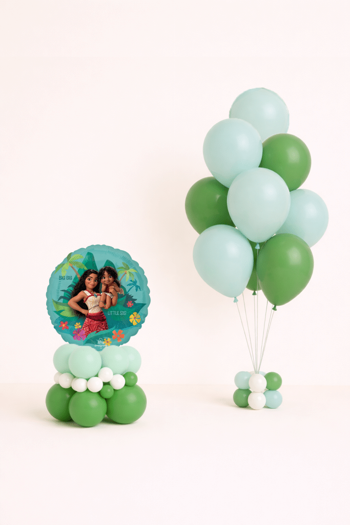 Moana themed balloon duo with mint and green latex bouquet and round Moana character balloon base in tropical colours