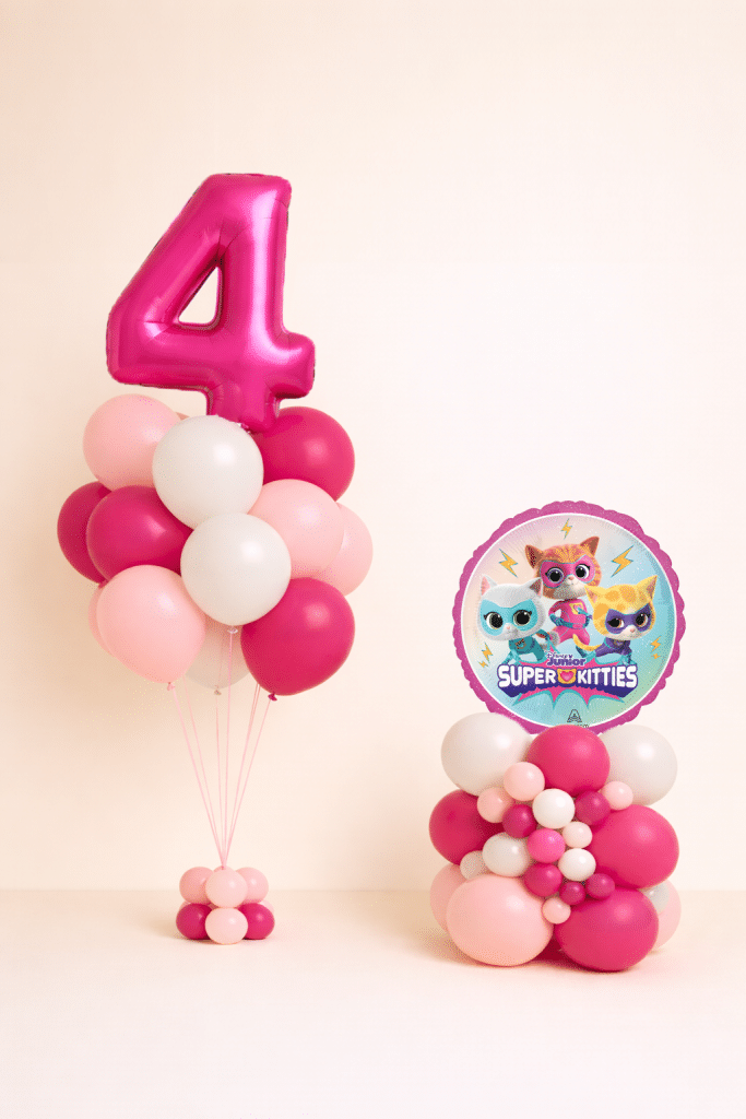 Super Kitties themed birthday balloon duo with pink number 4 helium bouquet and matching pink white balloon display base on neutral background