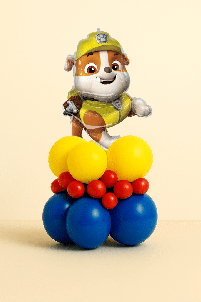 Paw Patrol Rubble foil balloon on a yellow, blue and red latex balloon base with small red accent balloons, displayed on a neutral background.