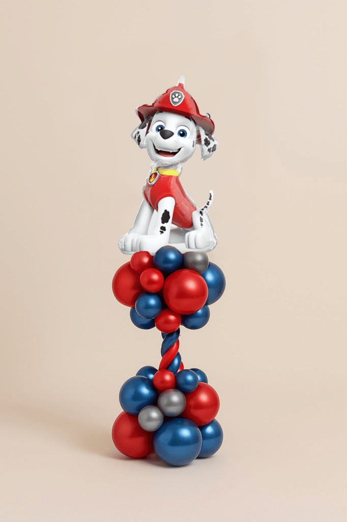Paw Patrol Marshall foil balloon on a red and blue spiral balloon column with a red, blue and silver latex balloon base on a neutral background.