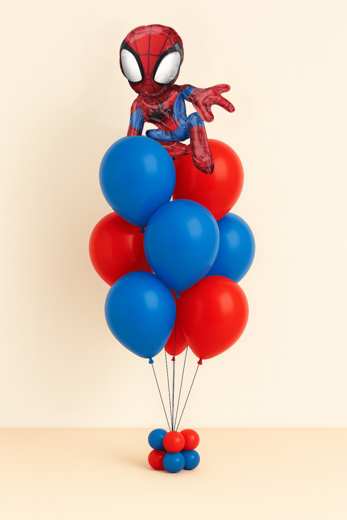 Spider-Man action pose foil balloon placed above a helium bouquet of red and blue latex balloons on a matching balloon base against a neutral background.