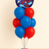 Round Spider-Verse foil balloon with multiple Spider characters placed above a helium bouquet of red and blue latex balloons on a matching balloon base against a neutral background.