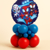 Round Spider-Man friends foil balloon mounted on a compact red and blue latex balloon base, designed as a superhero table centerpiece on a neutral background.
