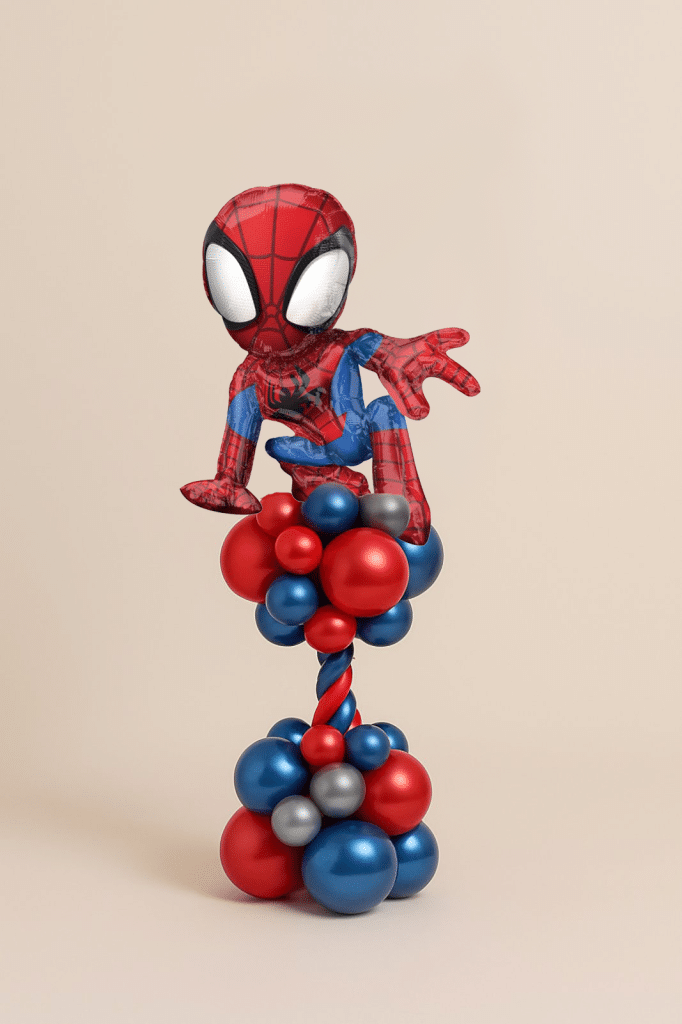 Spider-Man crouching foil balloon on a red and blue spiral balloon column with a matching balloon base on a neutral background.