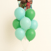 Moana and Maui shaped foil balloon above a bouquet of mint green and green latex balloons with a small matching base on a neutral background.