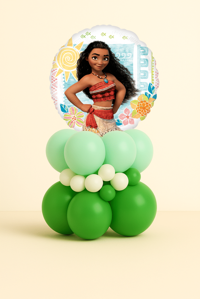 Round Moana foil balloon on a layered green, mint, and ivory latex balloon base on a neutral background.