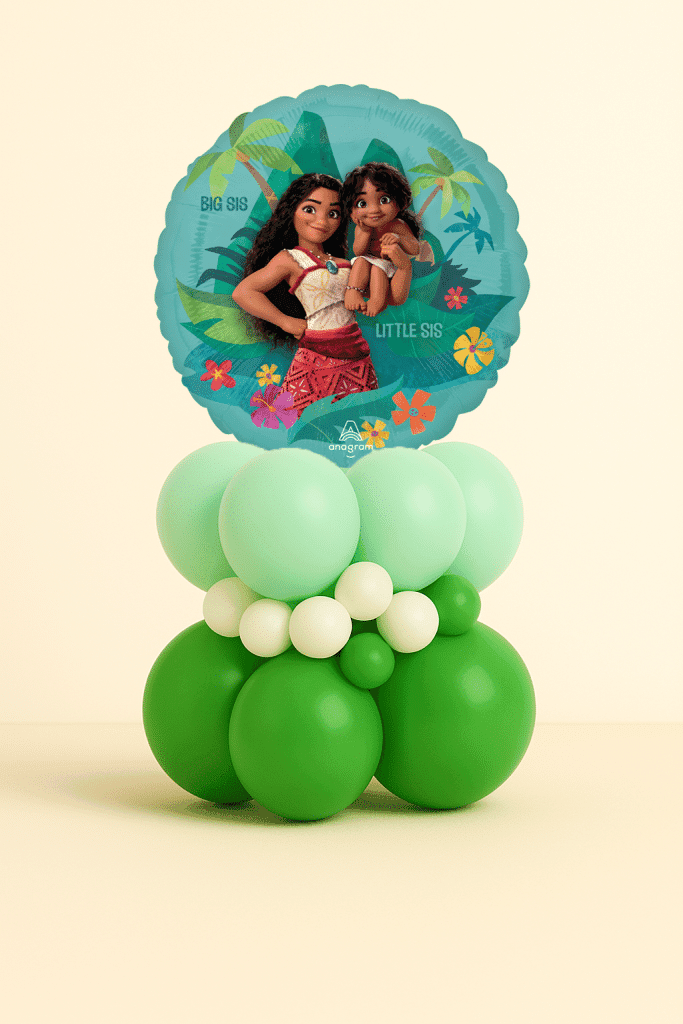 Round Moana Big Sis Little Sis foil balloon on a layered mint green, dark green, and ivory latex balloon base on a neutral background.