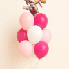 Skye Paw Patrol foil balloon on a pink and white latex balloon bouquet with small balloon base on a neutral background