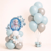 Frozen princess Elsa balloon centerpiece with matching ice blue white and silver helium balloon bouquet winter birthday decoration