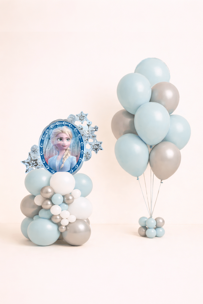 Frozen princess Elsa balloon centerpiece with matching ice blue white and silver helium balloon bouquet winter birthday decoration