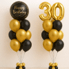Black and gold birthday balloon duo with gold number balloons and happy birthday round orb balloon elegant luxury celebration decoration