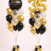 Black and gold confetti birthday balloon duo with gold number balloons and happy birthday round foil balloon elegant luxury celebration decoration