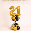Black gold and silver birthday number balloon column with ceiling balloons luxury celebration setup elegant party decoration