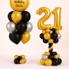 Black and gold personalised birthday balloon duo with custom gold orb balloon and gold number balloon column luxury celebration decoration