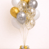 Gold silver and white balloon bouquet with gold confetti balloons elegant luxury party decoration arrangement
