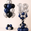 Navy blue black and silver birthday balloon duo with silver number balloon column and matching helium balloon bouquet modern celebration decoration