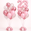 Blush pink and rose gold birthday balloon duo with pink number balloons and rose gold confetti balloons elegant feminine celebration decoration
