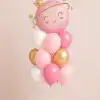 Smiling planet foil balloon bouquet with soft pink, white and metallic gold helium balloons and matching balloon base.