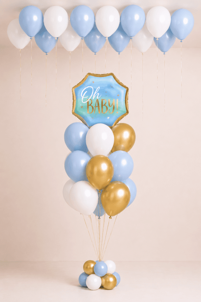 Oh Baby balloon bouquet with blue, white and gold helium balloons, matching base and 15 floating ceiling balloons.