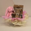 Pink baby girl gift box with Keel Toys bunny and AMEK Toys silicone bib, vacuum bowl, cup, cutlery and teether, beautifully presented in pink and cream wrapping.